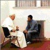 Saint Pope John Paul II visits his would-be assassin in a prison in Rome on Dec. 27, 1983